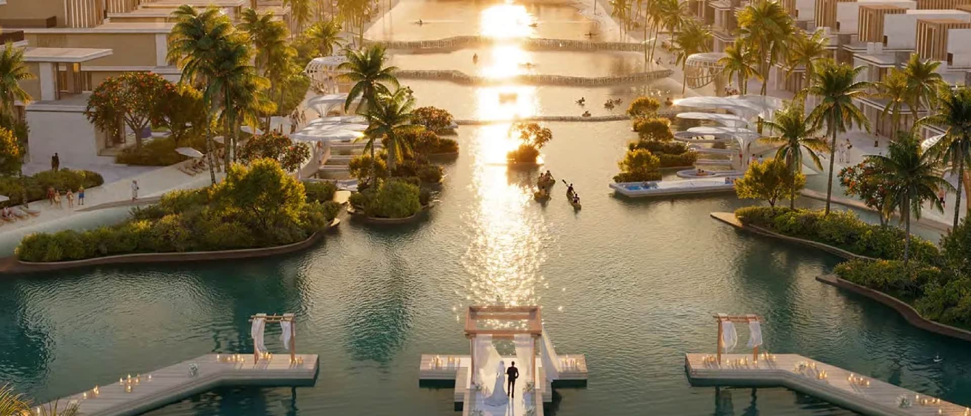 Luxury waterfront community at sunset with villas and lagoons