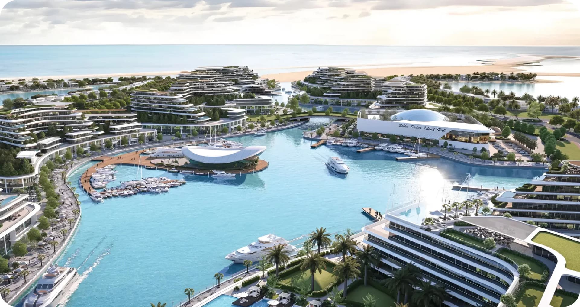 Aerial view of luxurious waterfront development with yachts