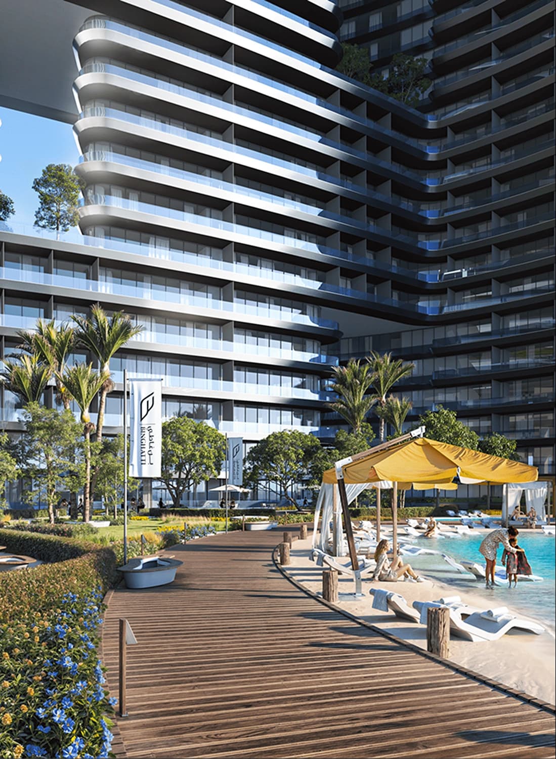 Swimming pool area with a modern building and sunbeds