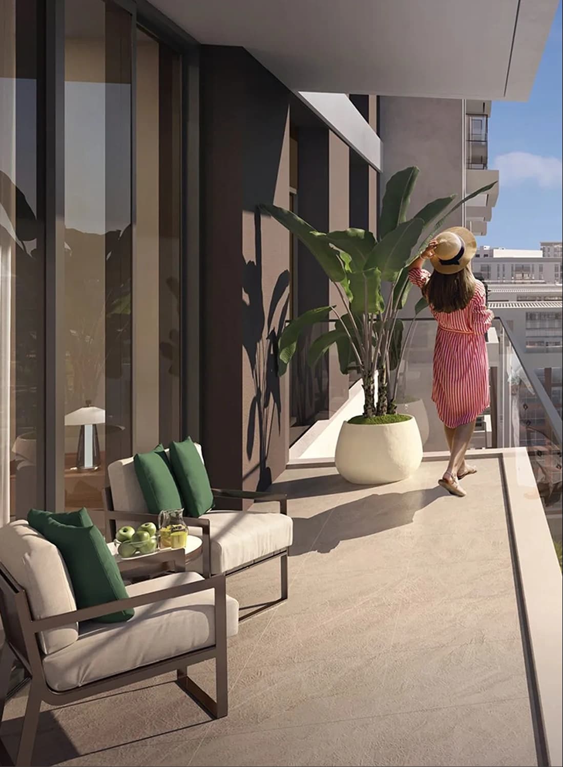 Woman enjoying a balcony with modern furniture and plants