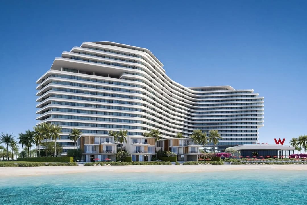 Luxury beachfront resort with modern architecture, palms