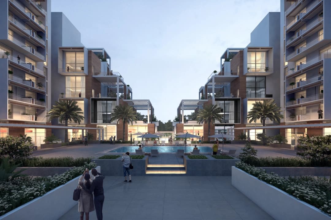 Elegant apartment complex with pool and people enjoying it