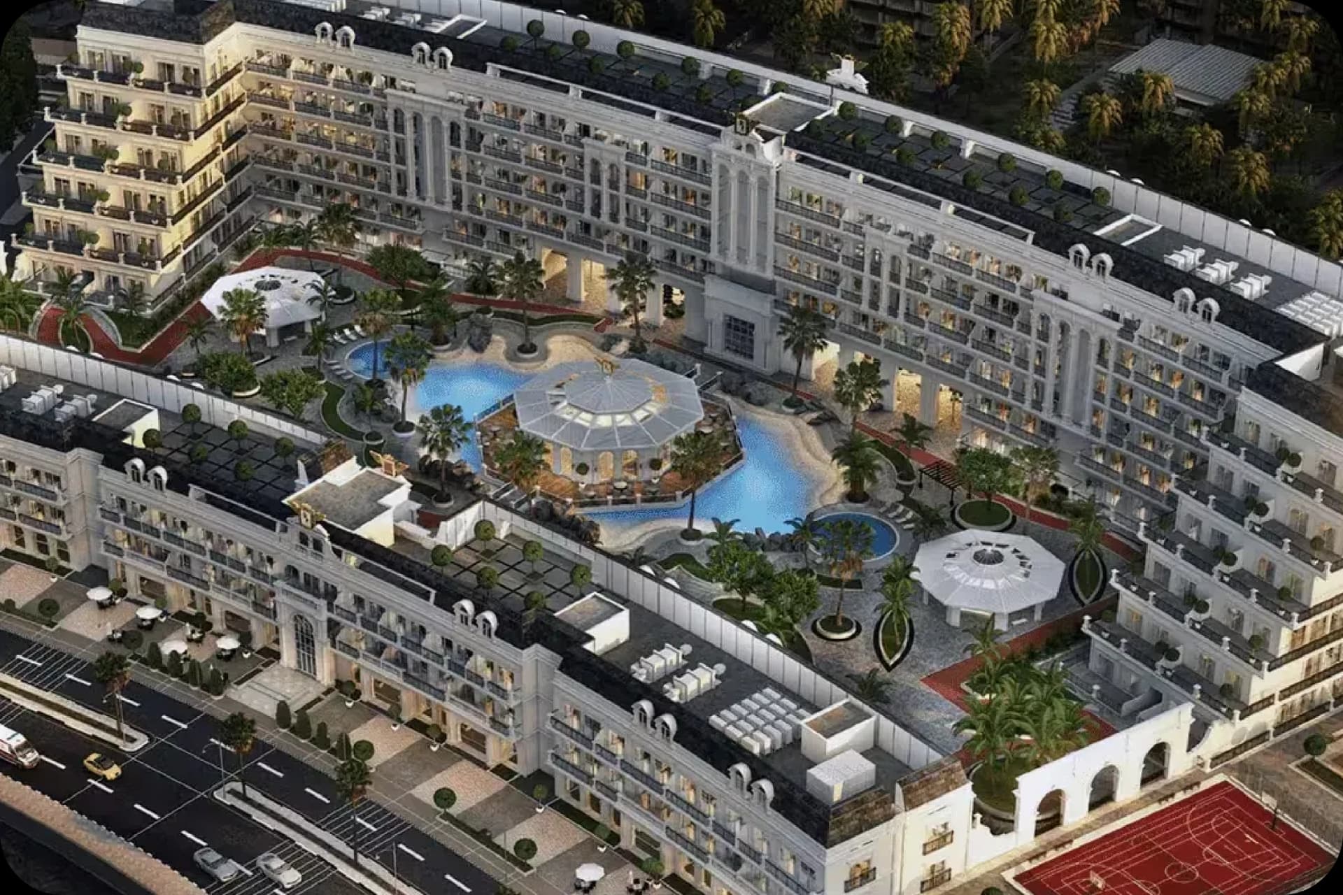 Poolside view with lounging areas and greenery in a residential complex