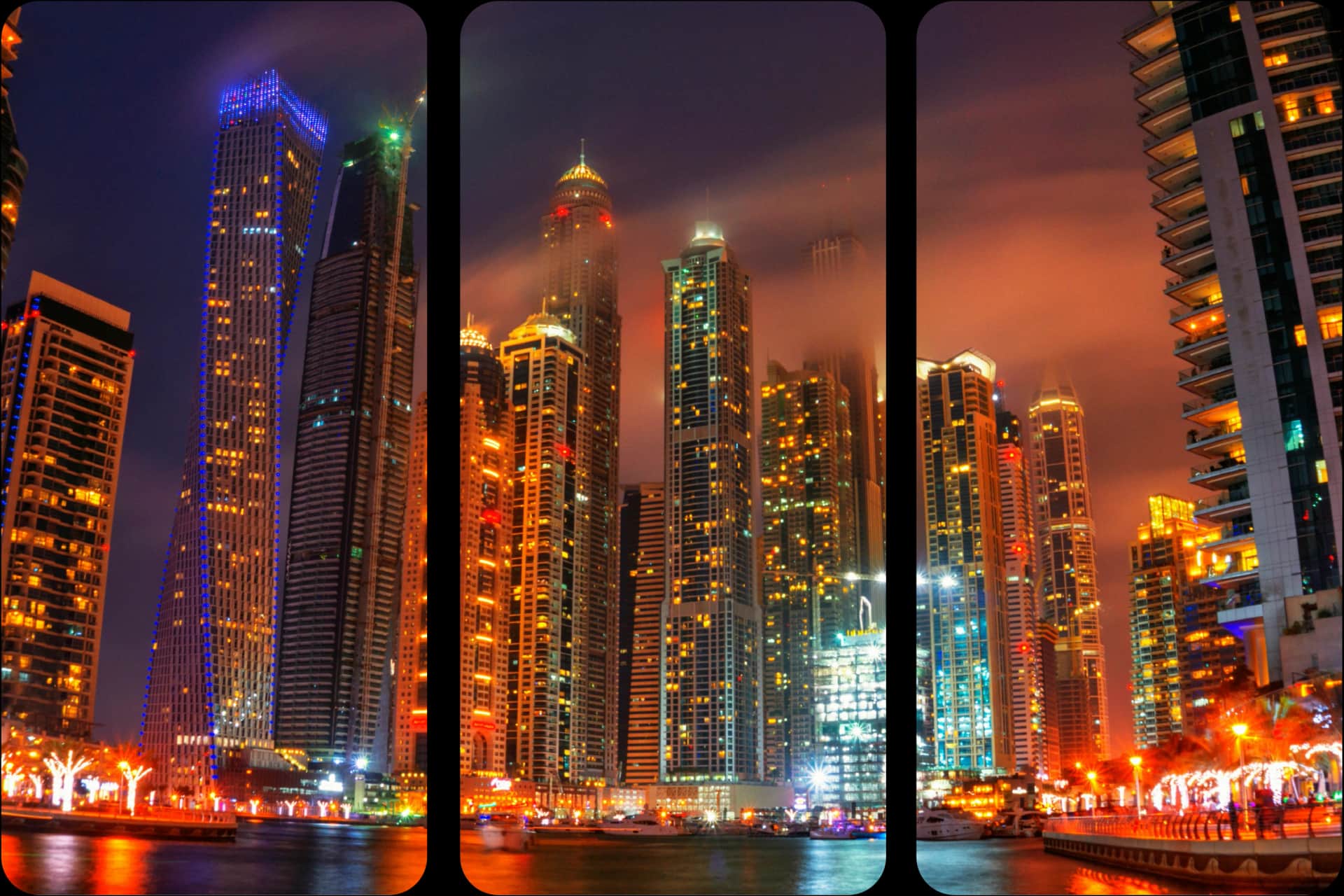 منظر ليلي لناطحات السحاب والواجهة البحرية في مرسى دبي