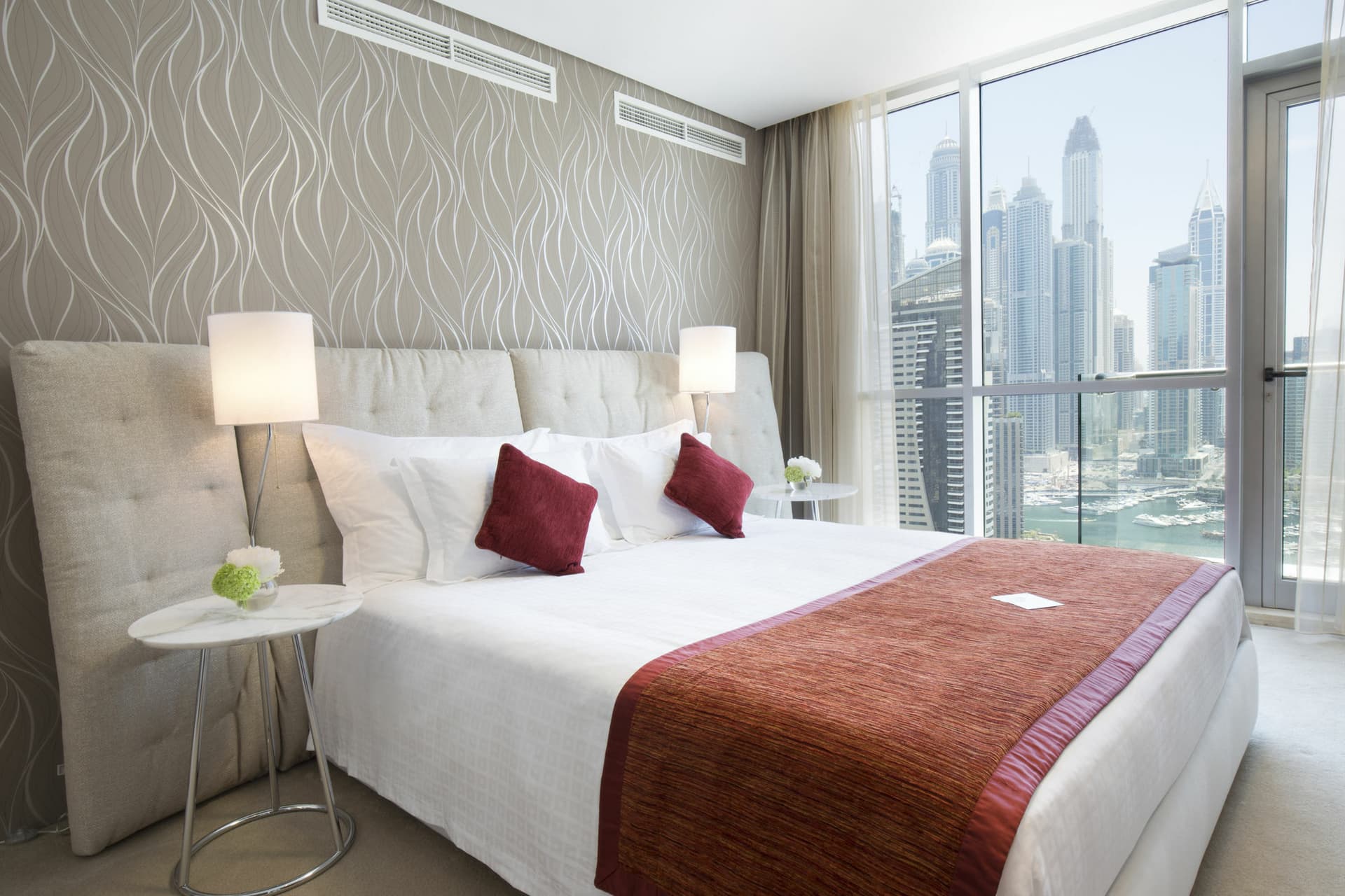 Modern bedroom with a view of Dubai Marina skyline