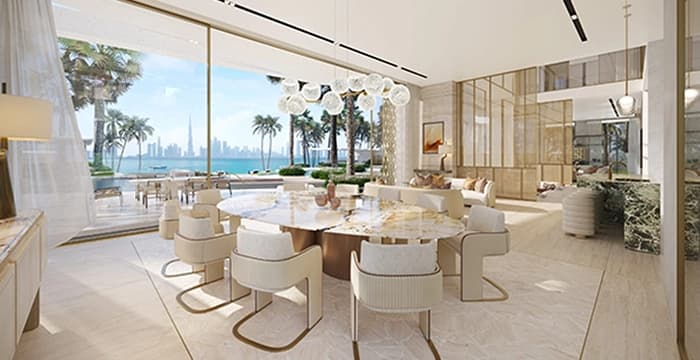 Dining room with marble table and outdoor view windows