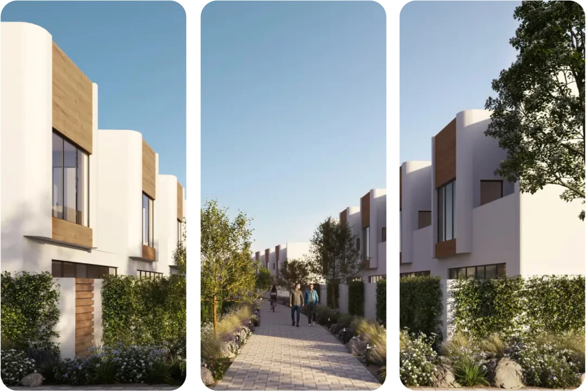 Tree-lined walkway between modern townhouses with people walking
