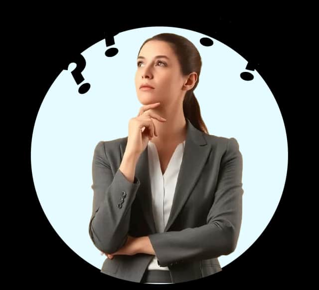 Business woman thinking with question marks around her